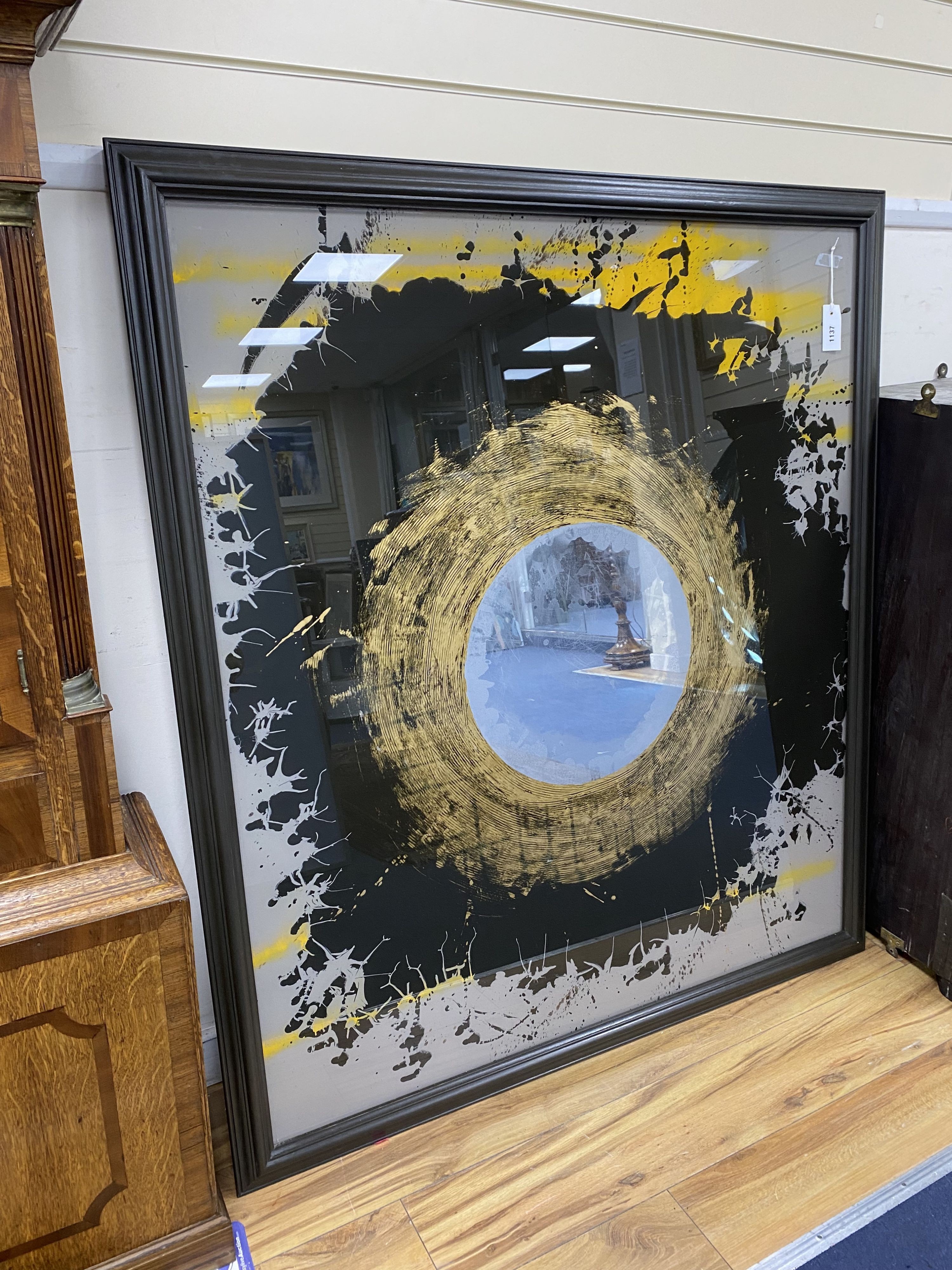 A large contemporary artwork on glass, with abstract pattern and centre mirror in frame, unsigned width 118cm, height 135cm